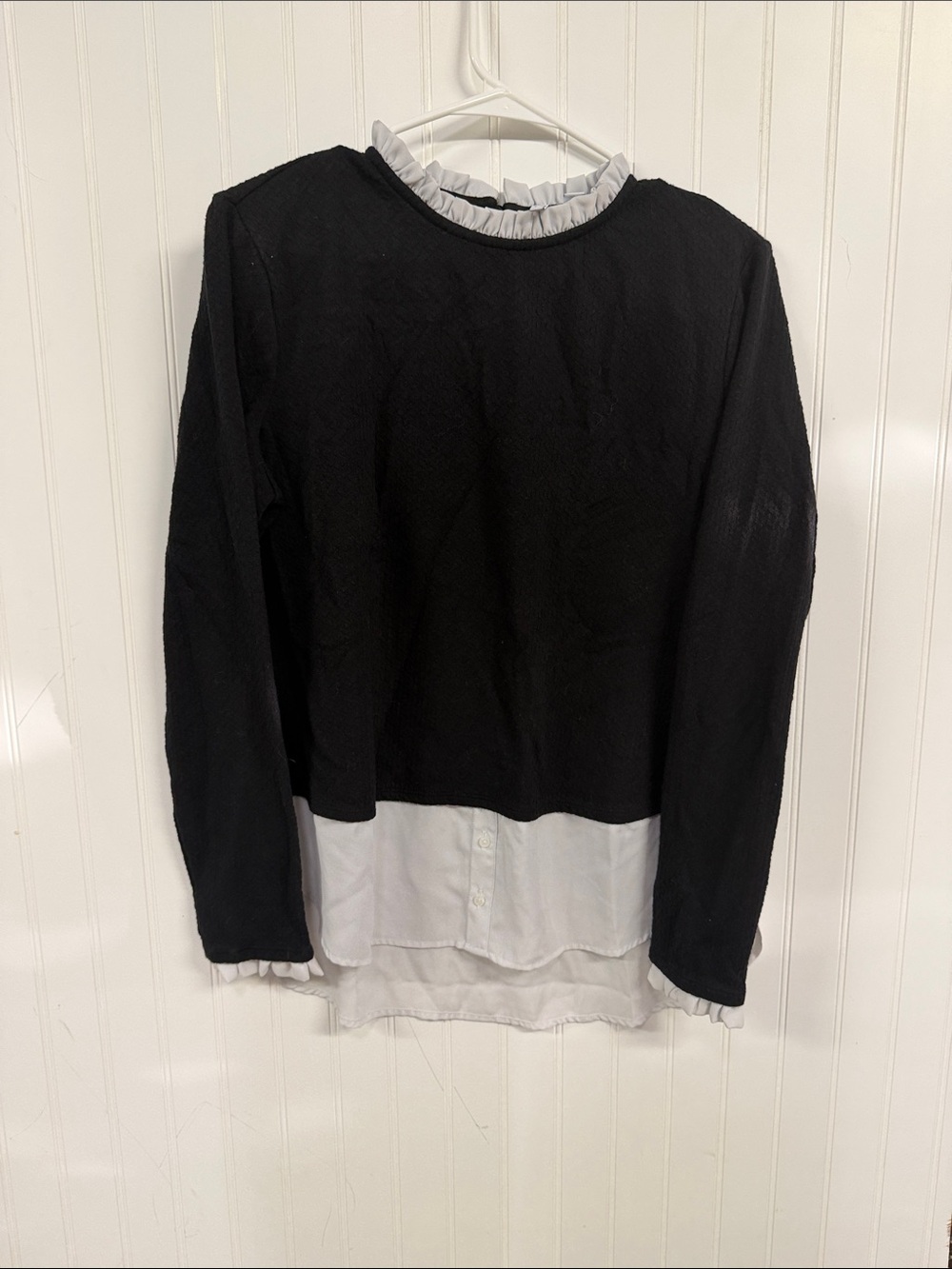 Elle Black Long-Sleeve Layered Top with White Shirt Hem and Ruffle Neck